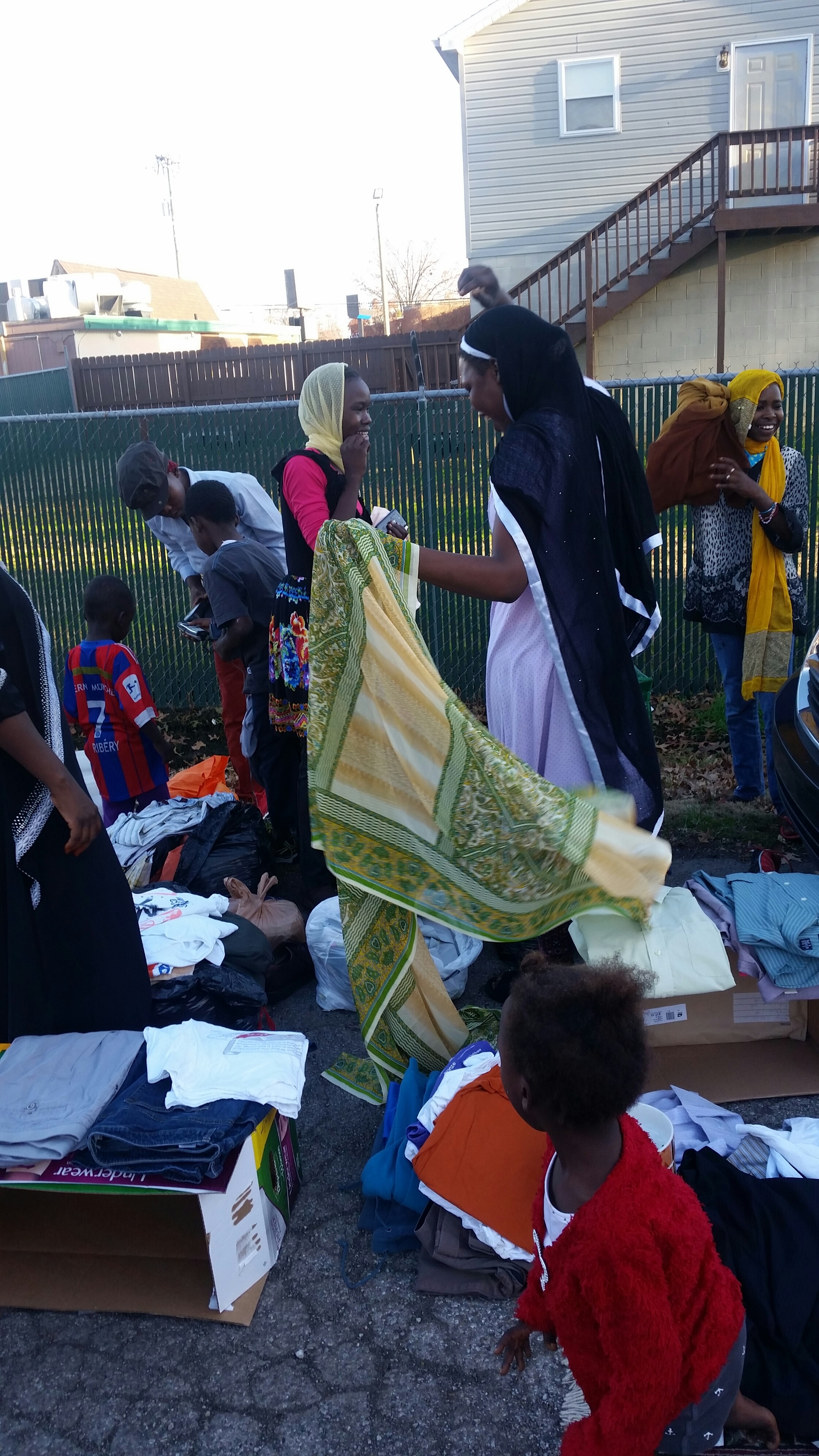 Winter clothes, guides to US for Darfur refugees