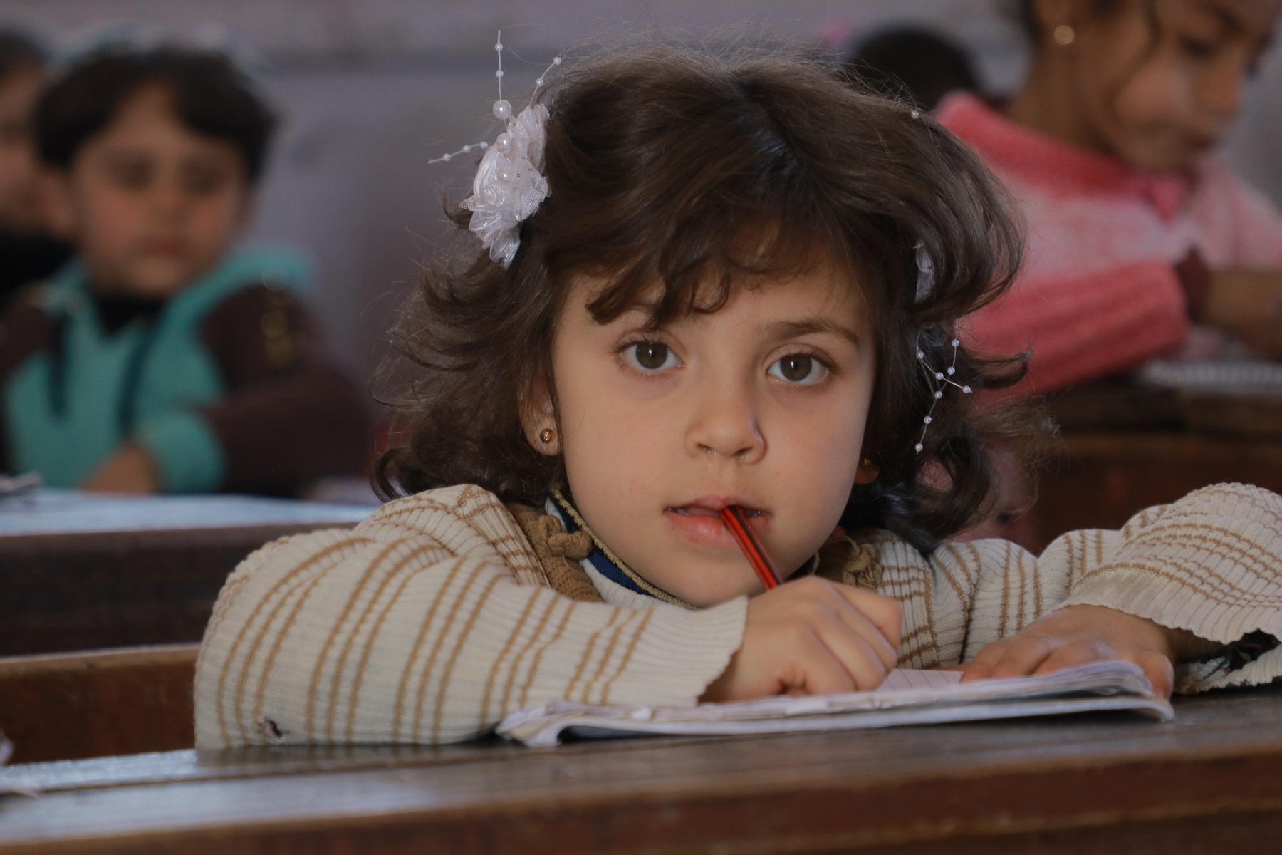 Build classrooms and teach kids in Syrian camps