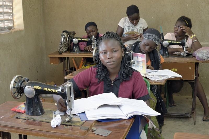Train idle youth in tailoring